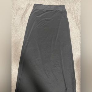 Urban planet, satin black skirt, size medium, never worn before does not fit me